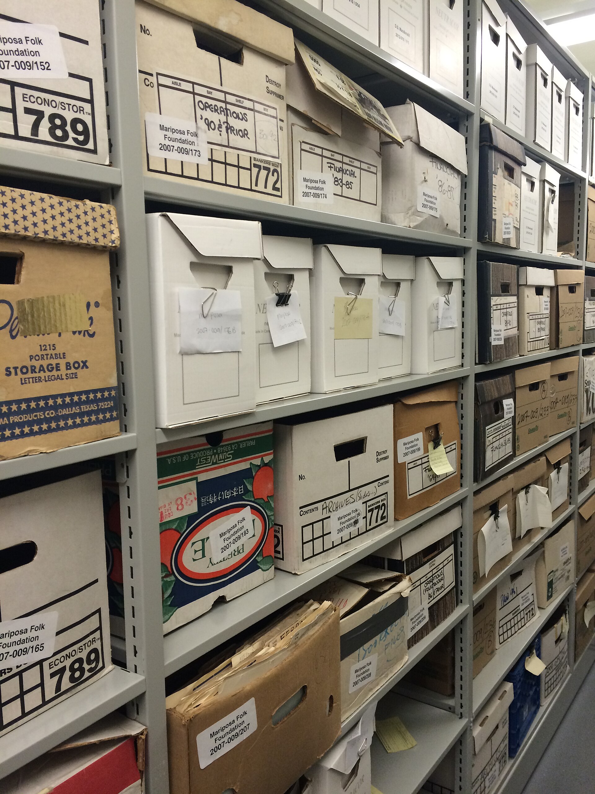 archive boxes library shelves documents